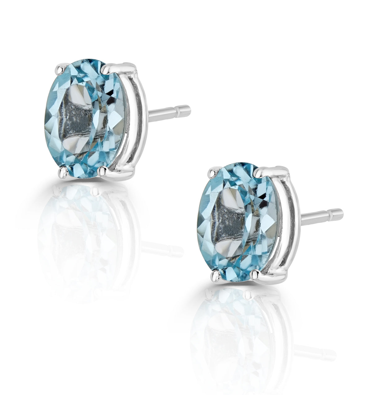 Blue Topaz 7 x 5mm and 9K White Gold Earrings